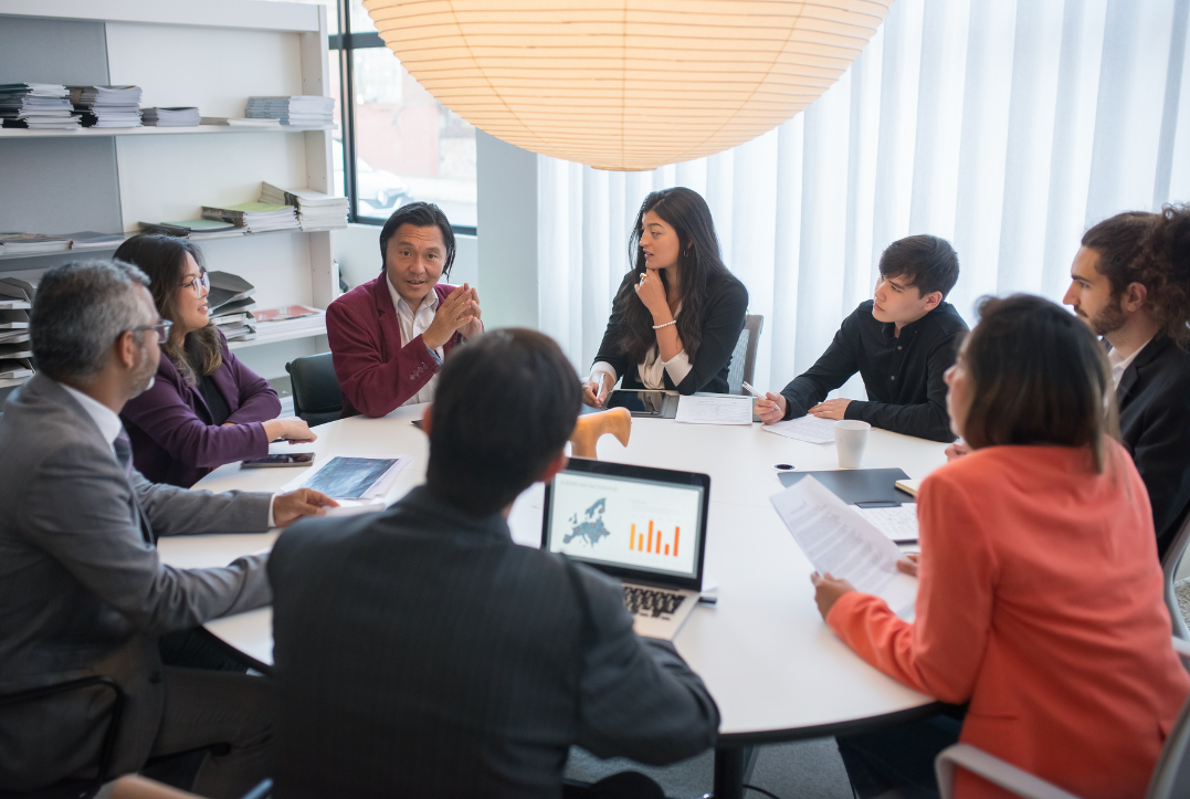 corporate team listening to manager